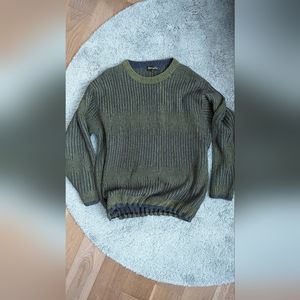 Green and navy sweater